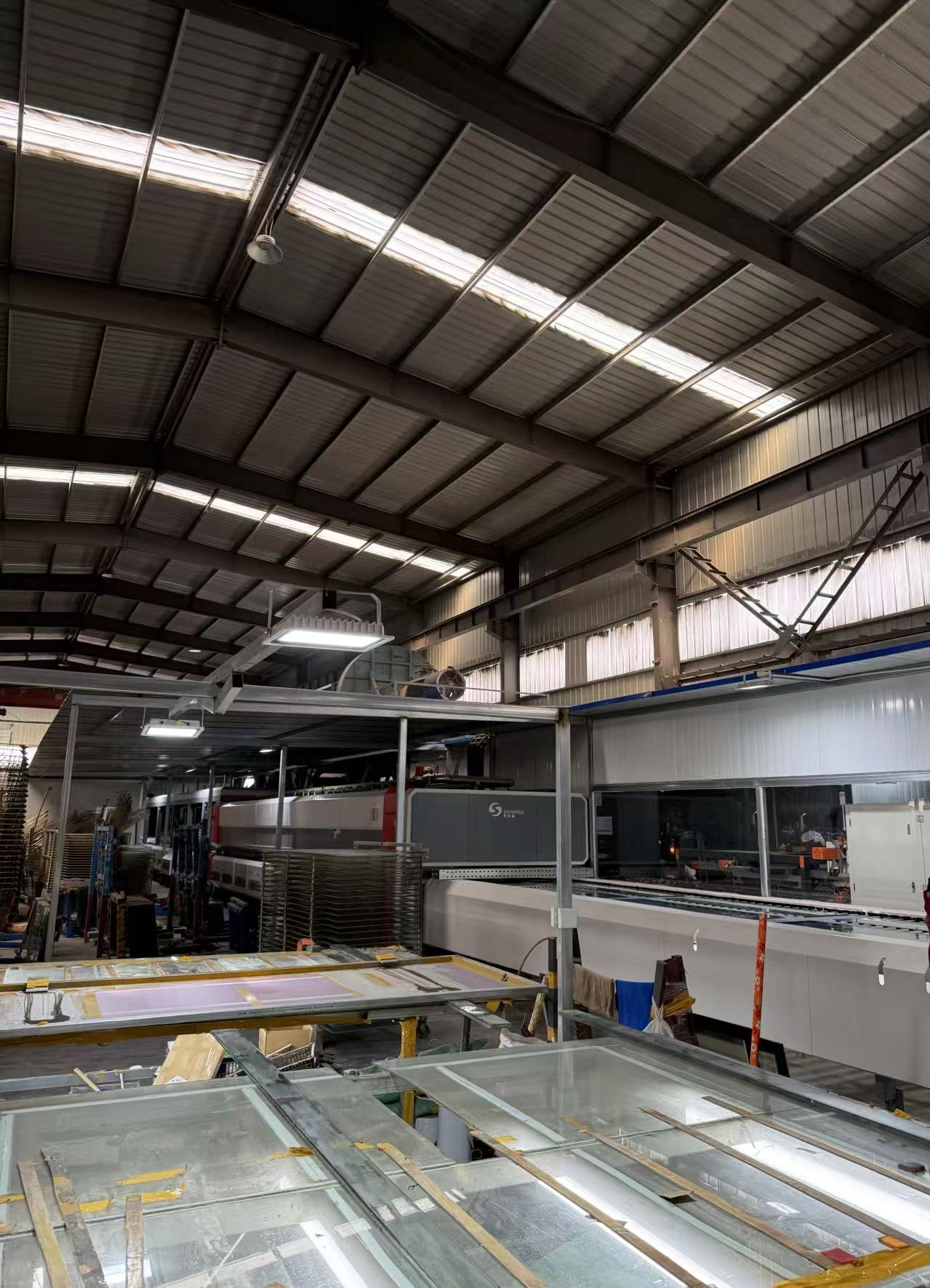 Factory building and production area for commercial refrigeration glass doors and door systems