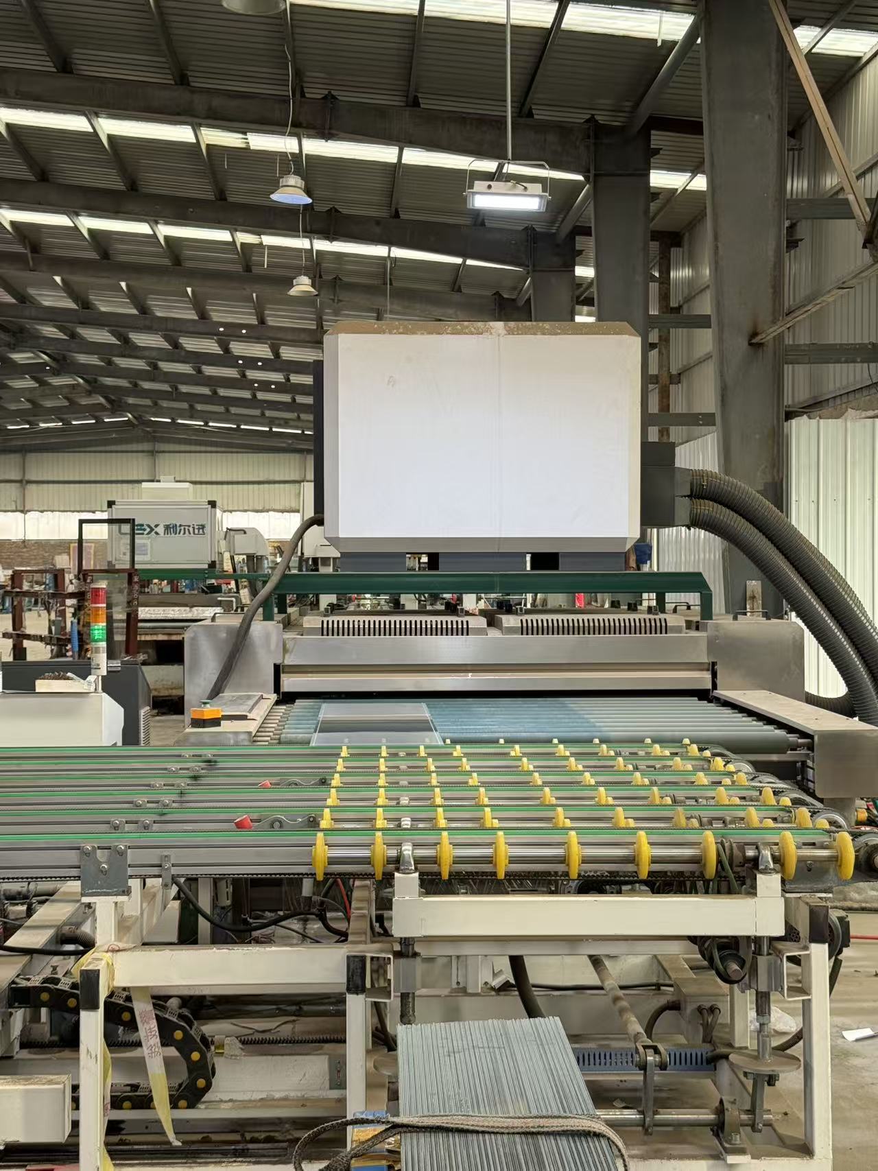 Factory workshop overview for refrigeration glass door production review