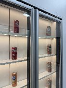 Door handle mounted on a refrigeration glass door