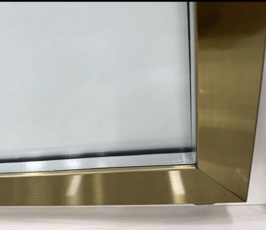 Titanium frame glass door edge detail